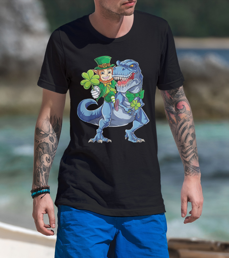 Leprechaun With Shamrock And Bowtie Riding T-Rex Dinosaur T-Shirt