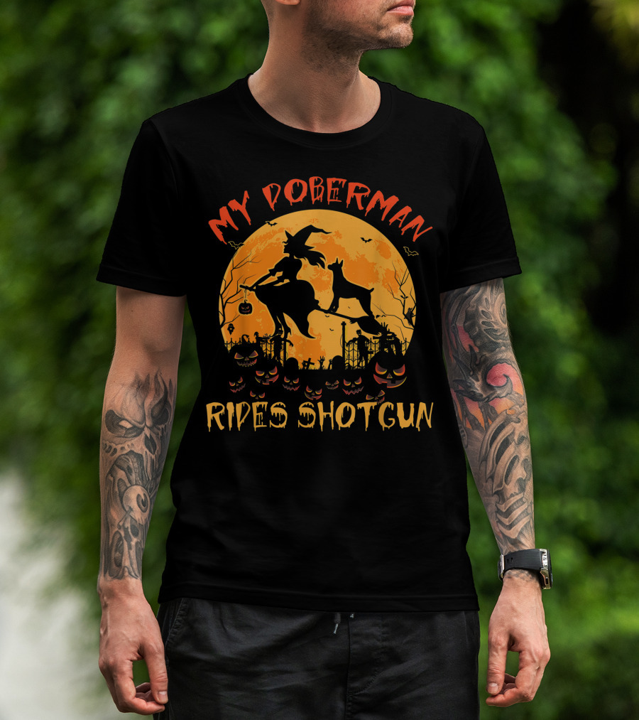 My Doberman Rides Shotgun Halloween Witch And Pumpkins Moon Scene T-Shirt