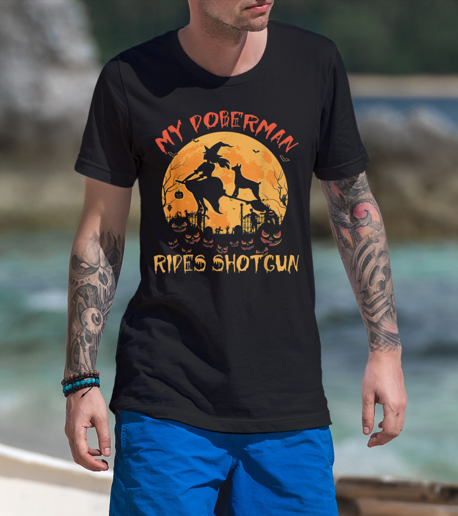 My Doberman Rides Shotgun Halloween Witch And Pumpkins Moon Scene T-Shirt