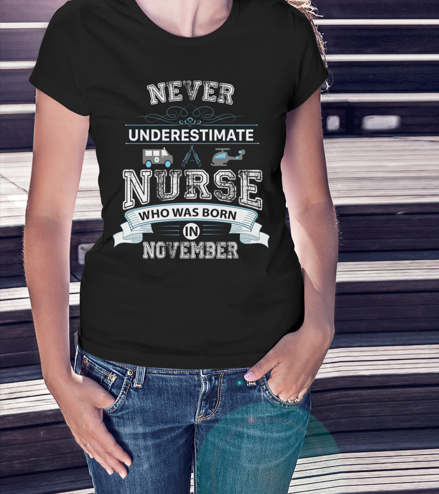 Never Underestimate A Nurse Born In November With Ambulance And Helicopter Elements T-Shirt