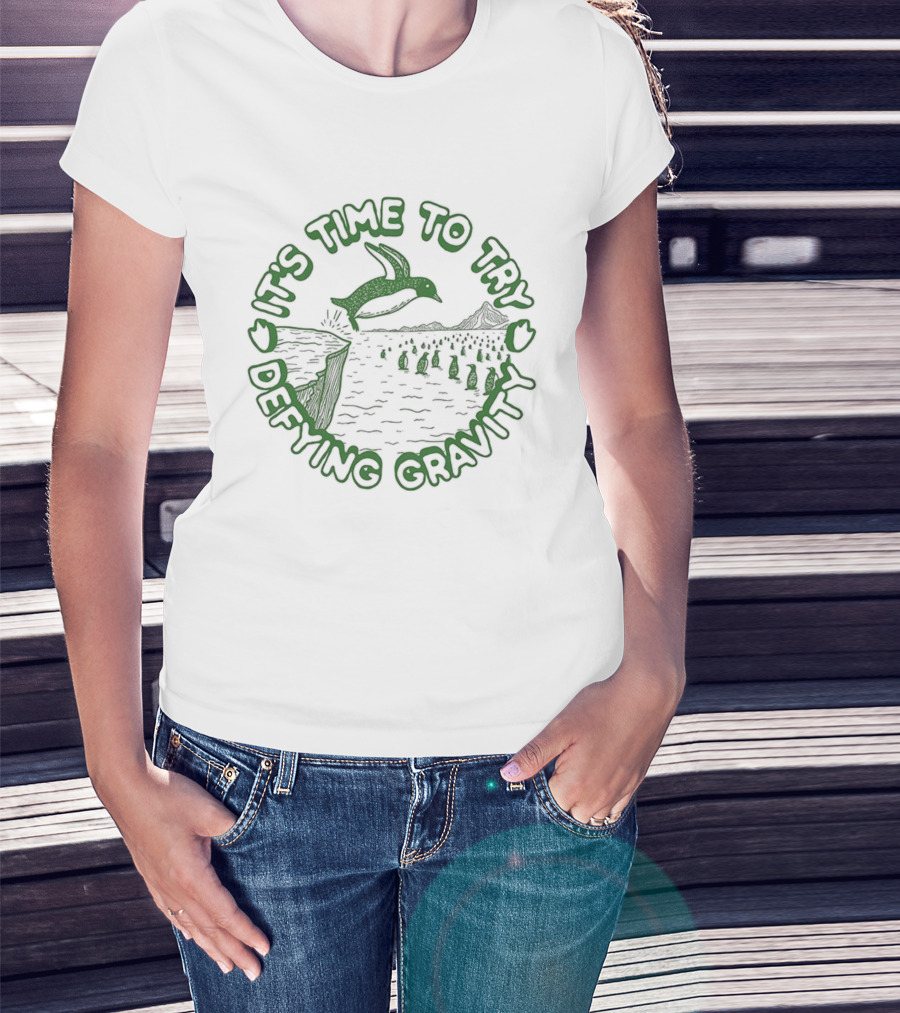 It's Time To Try Defying Gravity Penguin Jumping Scene T-Shirt