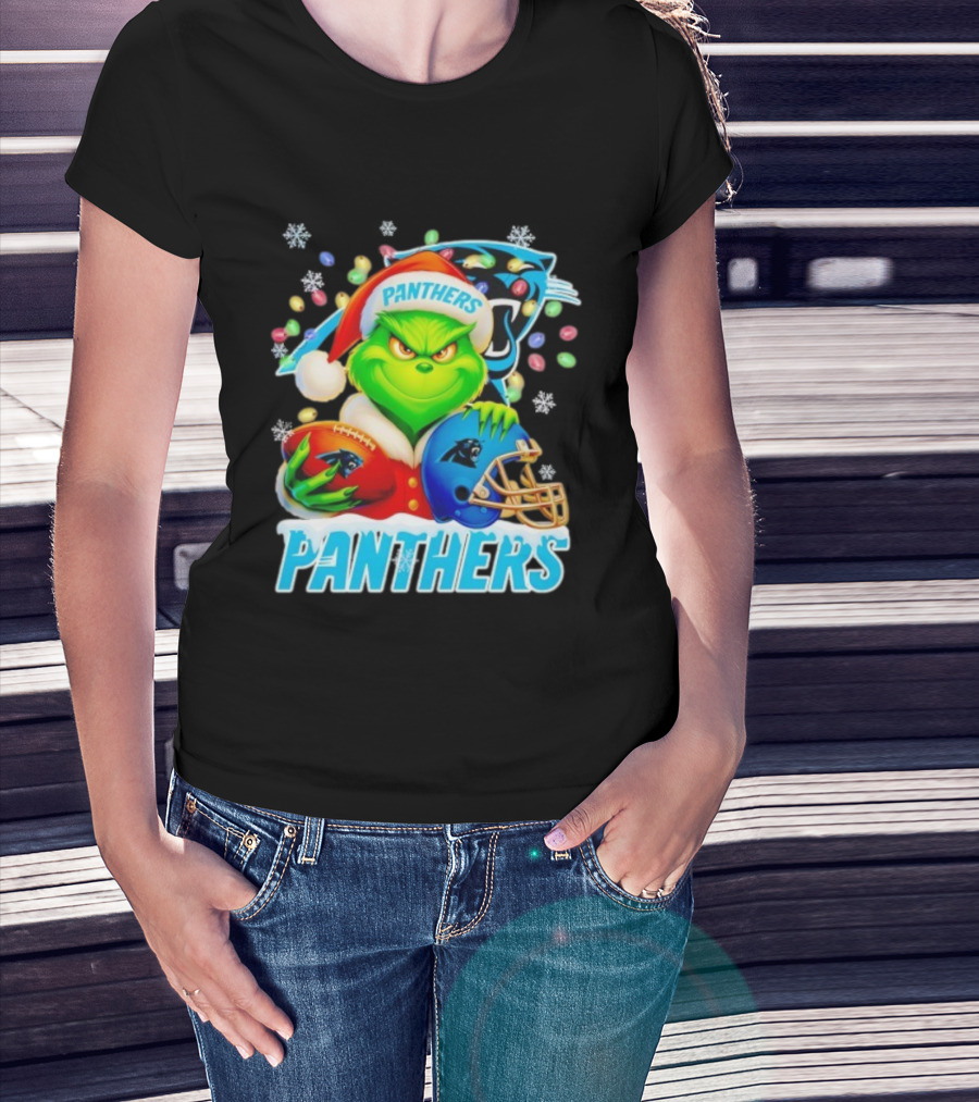 Grinch Santa Hat Holding Carolina Panthers Football And Helmet Merry Christmas T-Shirt