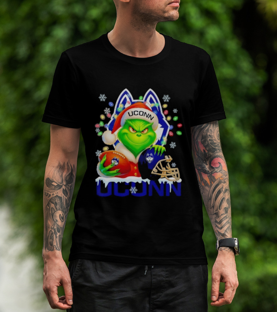 Grinch Wearing Santa Hat With UConn Huskies Football And Helmet Merry Christmas T-Shirt