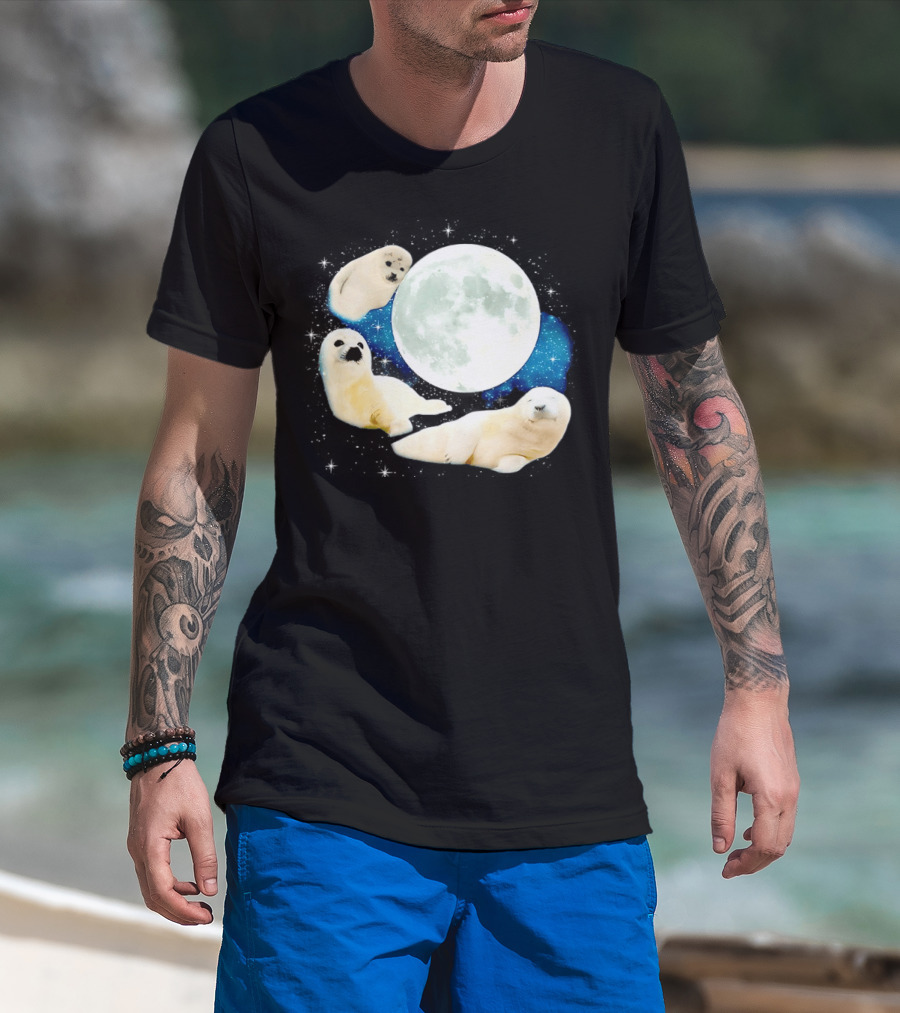 Adorable Seals Playfully Resting Under A Radiant Full Moonlit Sky With Cosmic Backdrop T-Shirt