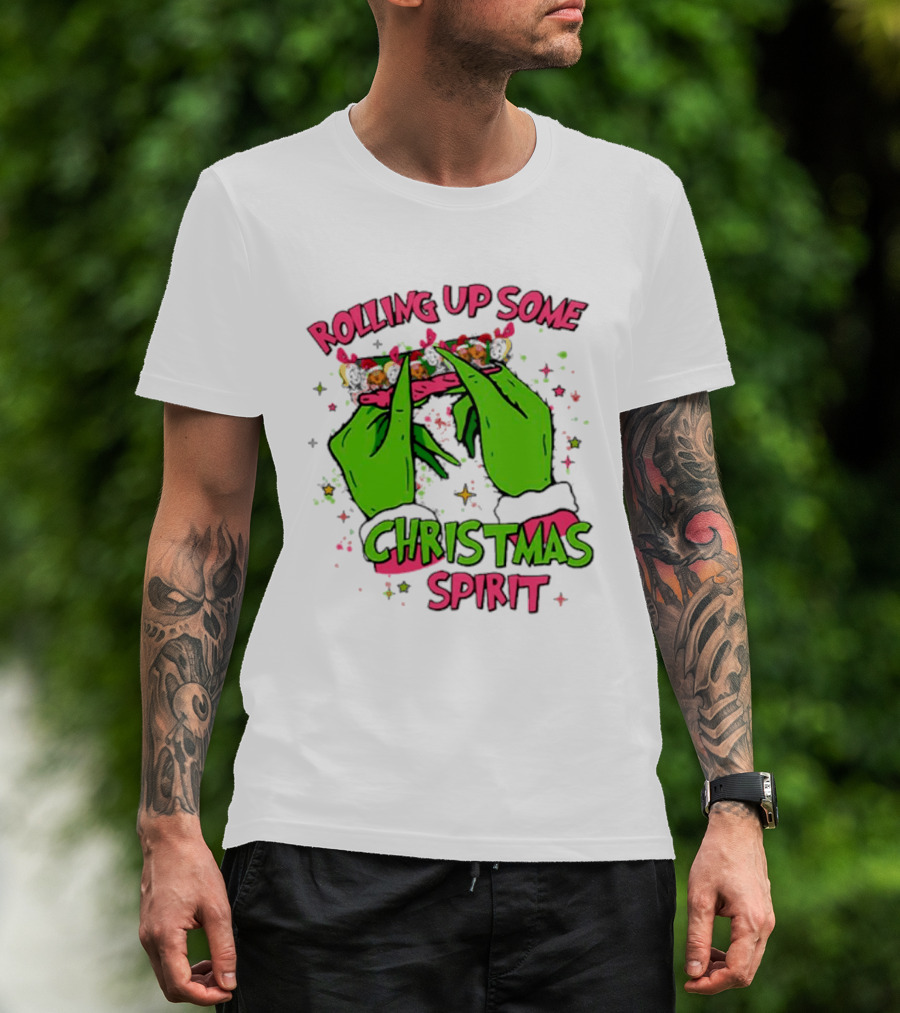 Grinch Rolling Up Some Christmas Spirit With Green Hands And Glitter Stars T-Shirt