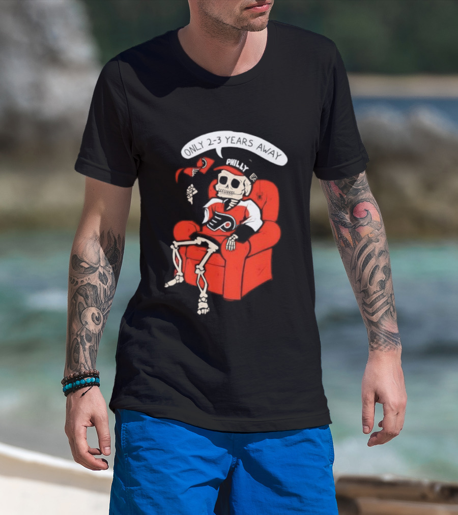 Flyers Skeleton Fan Waiting In Armchair With Cap And Jersey 2 3 Years Away T-Shirt