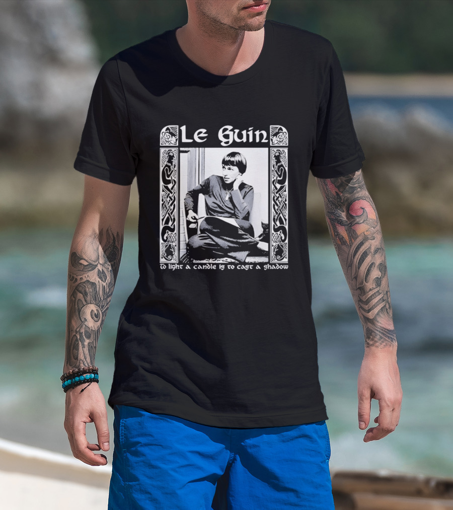 Le Guin To Light A Candle Is To Cast A Shadow T-Shirt