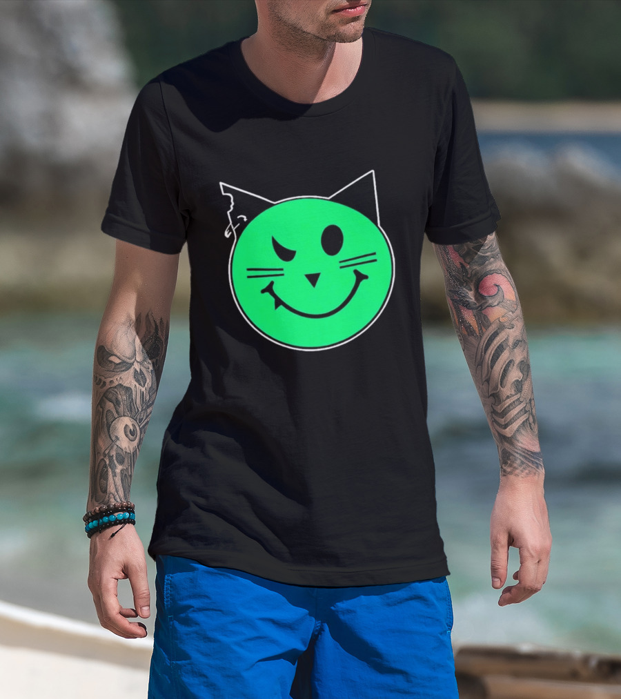 Taliesin Wearing MeowMeowz Smiling Cat Face With Green Circle Black Ears Whiskers T-Shirt