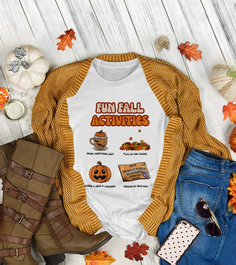 Fun Fall Activities Halloween Drink Something Cozy Ouija Board Carve A Jack O Lantern Play In The Leaves T-Shirt