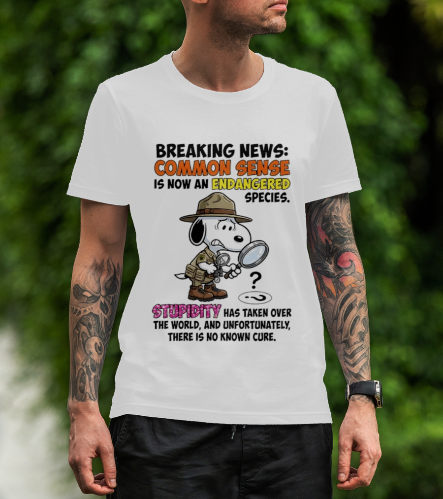 Breaking News Common Sense Endangered Species Stupidity Taken Over Snoopy T-Shirt