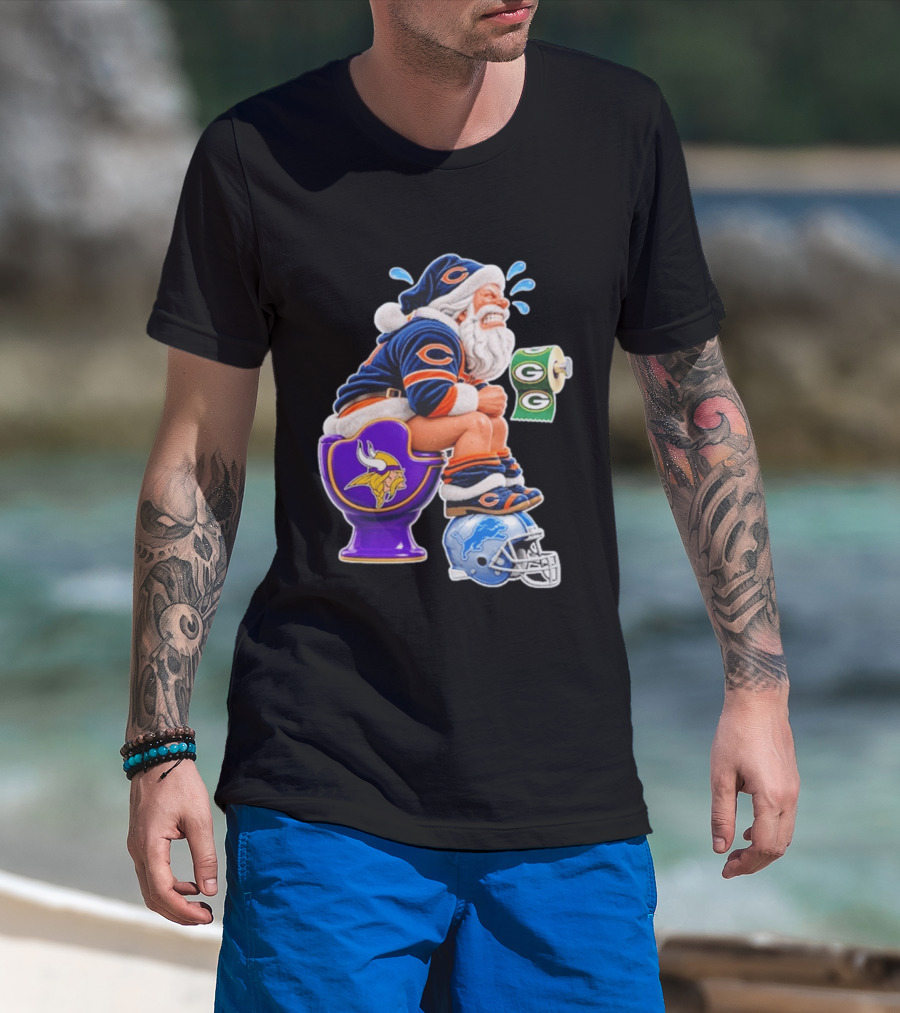 Santa Claus On Toilet Minnesota Vikings Detroit Lions Green Bay Packers Chicago Bears Funny Christmas 2026 Football T-Shirt