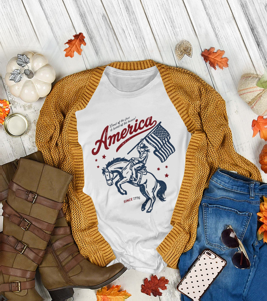 America Land of the Free Home of the Brave Since 1776 Cowboy Holding Flag Patriotic T-Shirt