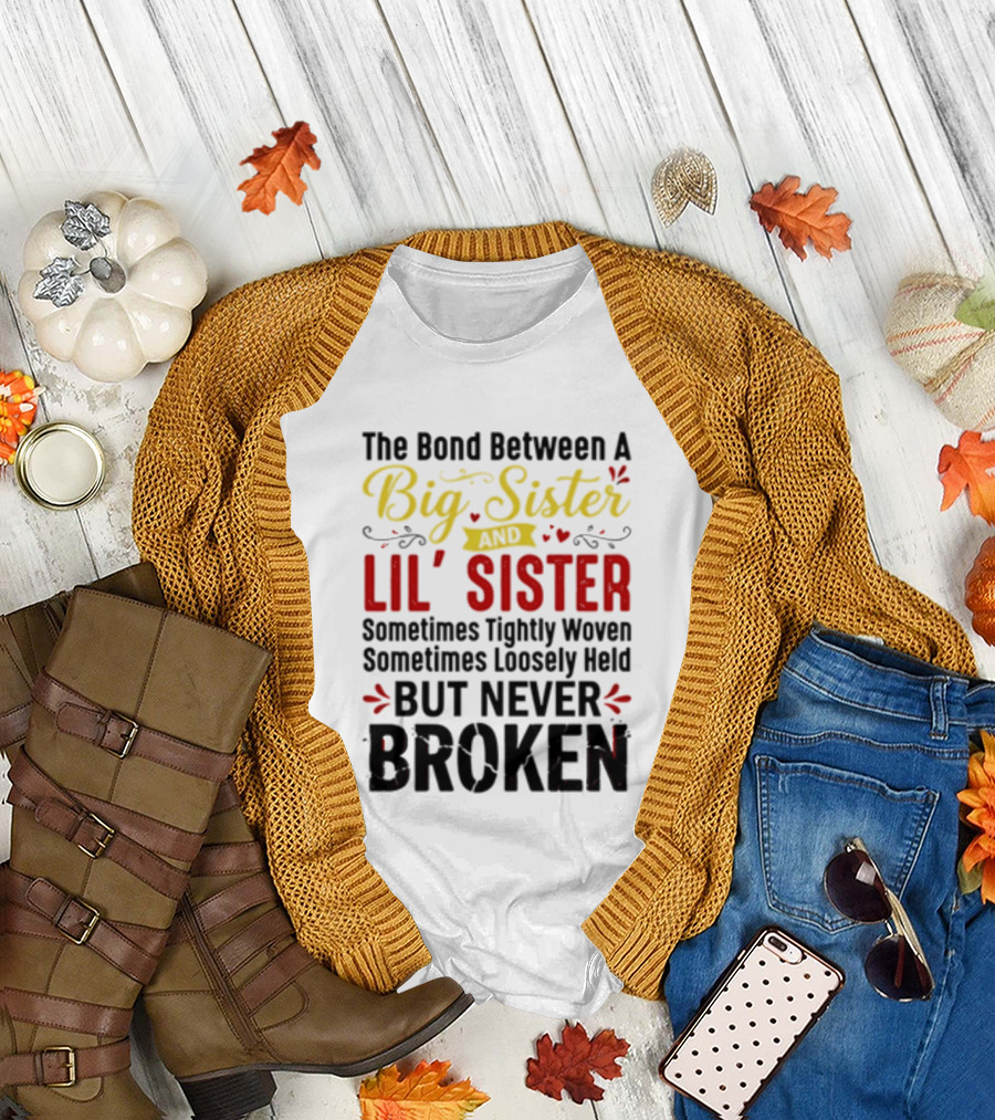 The Bond Between A Big Sister And Lil' Sister Sometimes Tightly Woven Sometimes Loosely Held But Never Broken T-Shirt