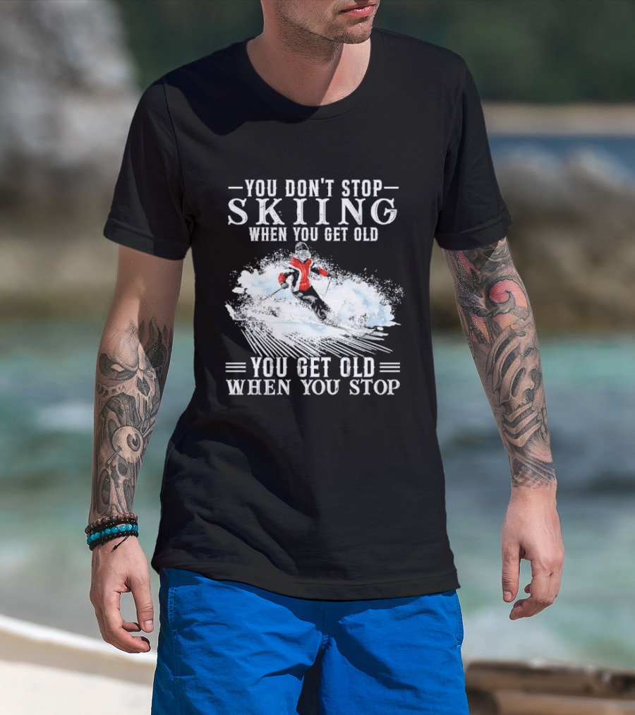 You Don't Stop Skiing When You Get Old You Get Old When You Stop Older Woman Skier Spraying Snow T-Shirt