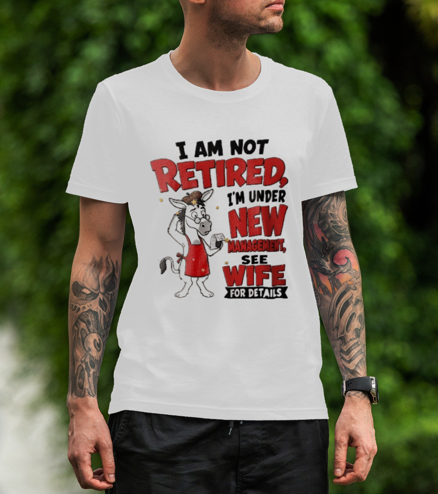 I Am Not Retired I'm Under New Management See Wife For Details Cartoon Donkey Red Apron T-Shirt