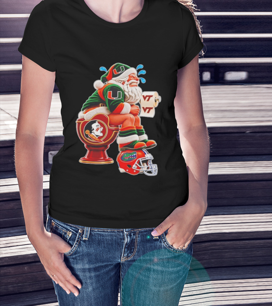 Miami Hurricanes Santa Claus Laughing On Florida State Toilet With Virginia Tech Toilet Paper And Florida Gators Helmet T-Shirt