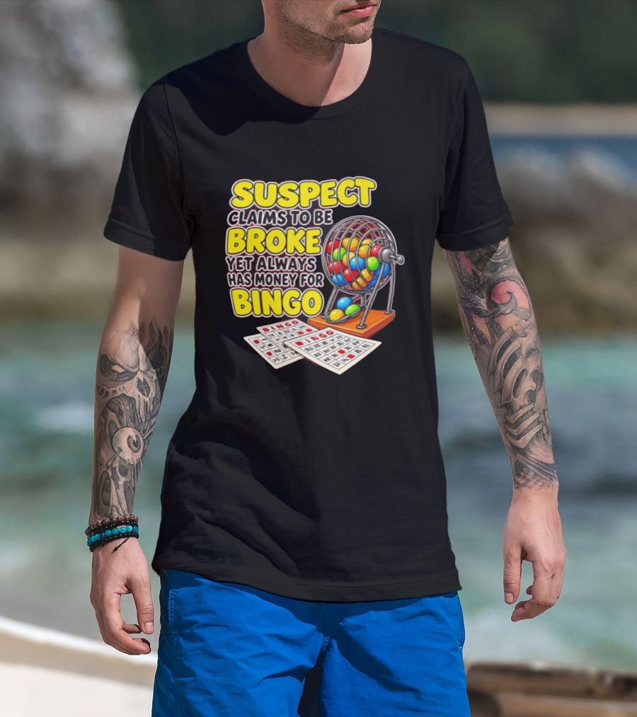 Suspect Claims To Be Broke Yet Always Has Money For Bingo With Colorful Bingo Cage And Cards T-Shirt