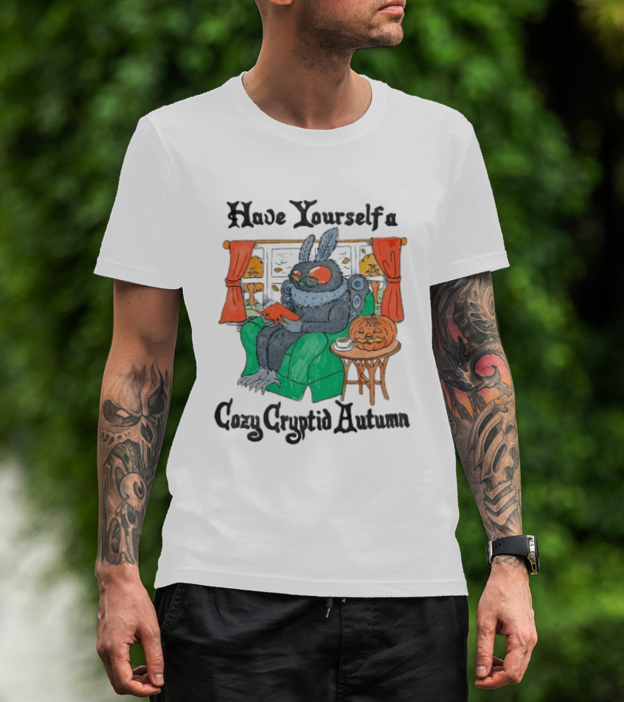 Have Yourself A Cozy Cryptid Autumn Mothman Reading By Pumpkin Window Scene T-Shirt