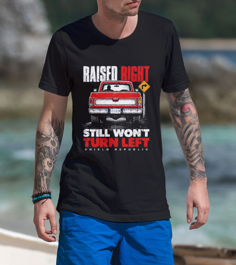 Raised Right Still Won't Turn Left Shield Republic Truck Back View With Right Turn Sign T-Shirt