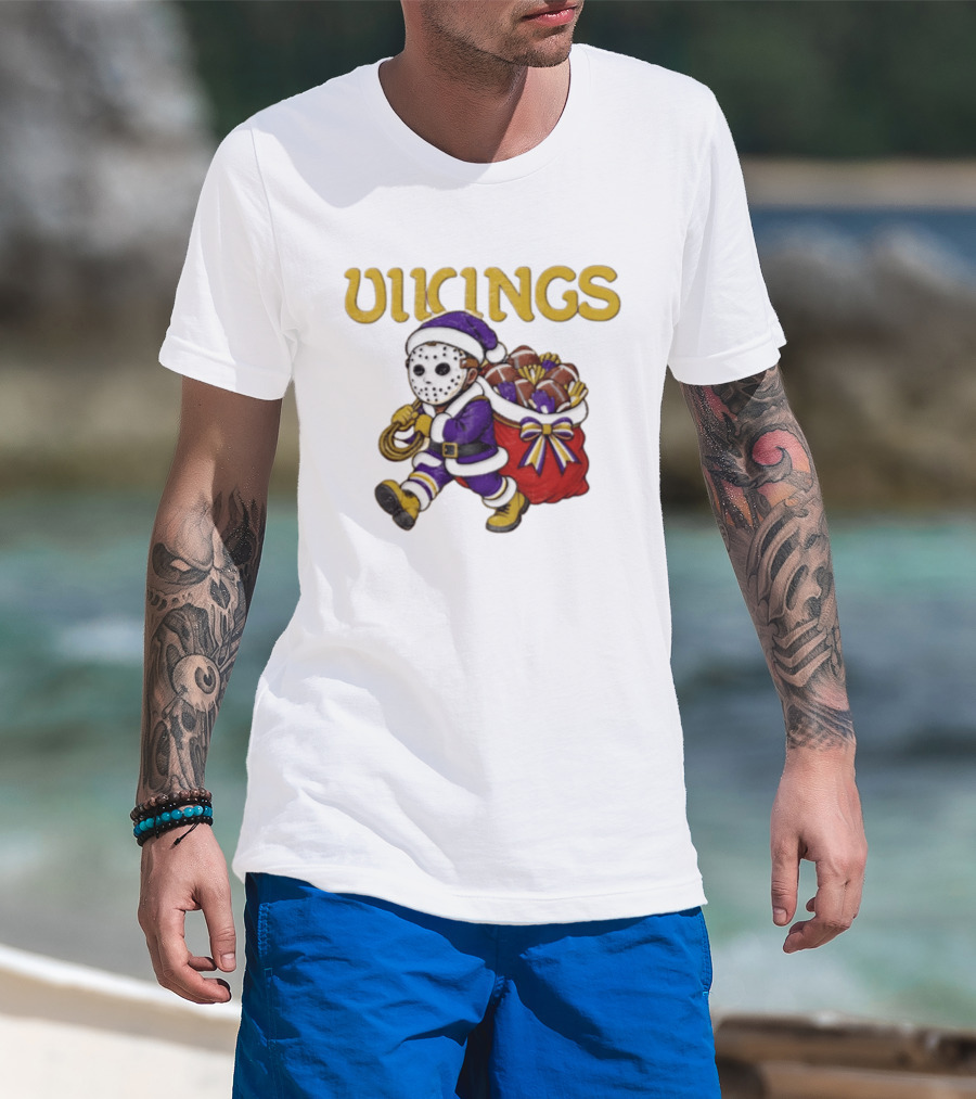Minnesota Vikings Football Christmas Purple And Gold Santa Carrying Footballs T-Shirt