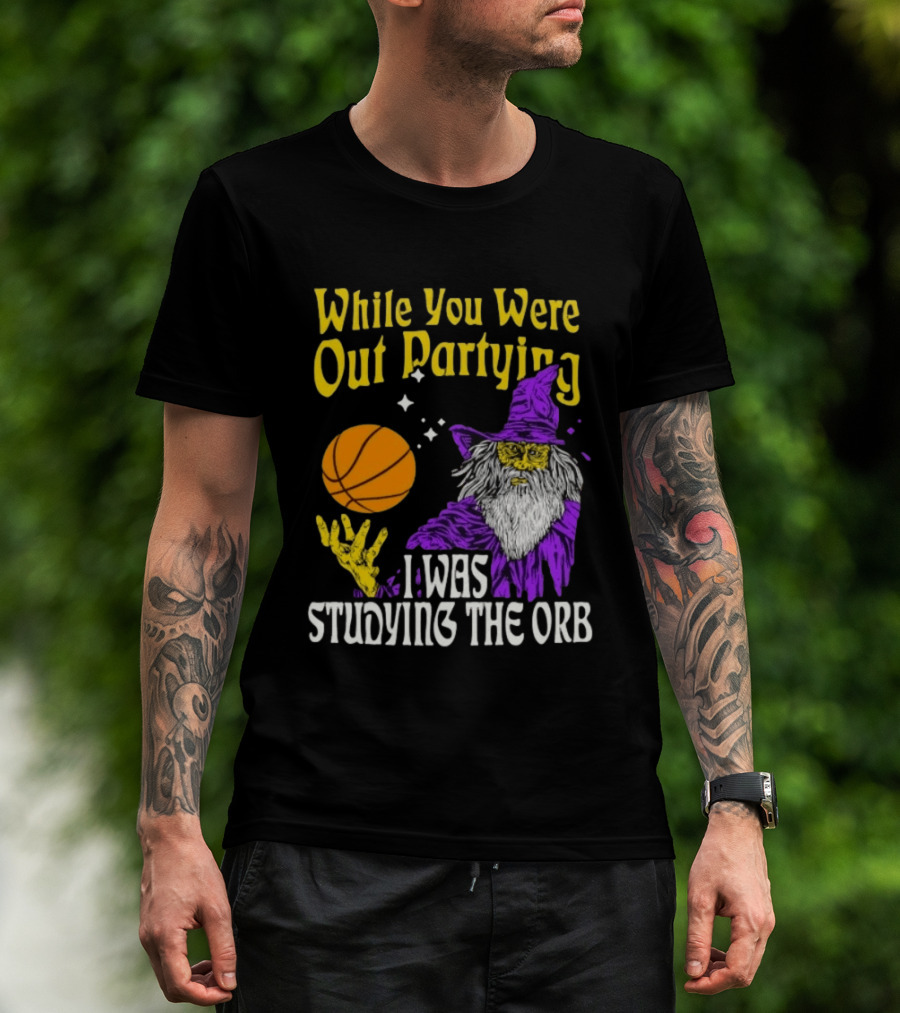 While You Were Out Partying I Was Studying The Orb Wizard Basketball T-Shirt