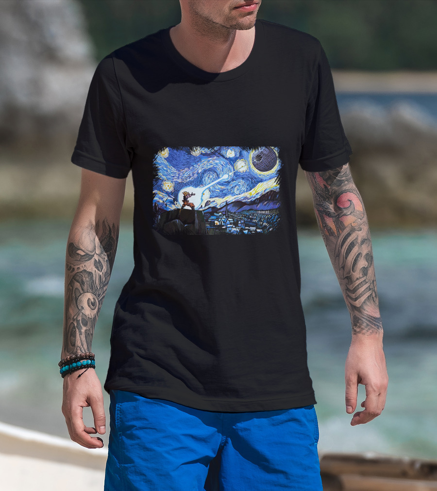 Man with tattoos models Van Gogh-Ku Starry Night Fusion Battle T-Shirt at beach.