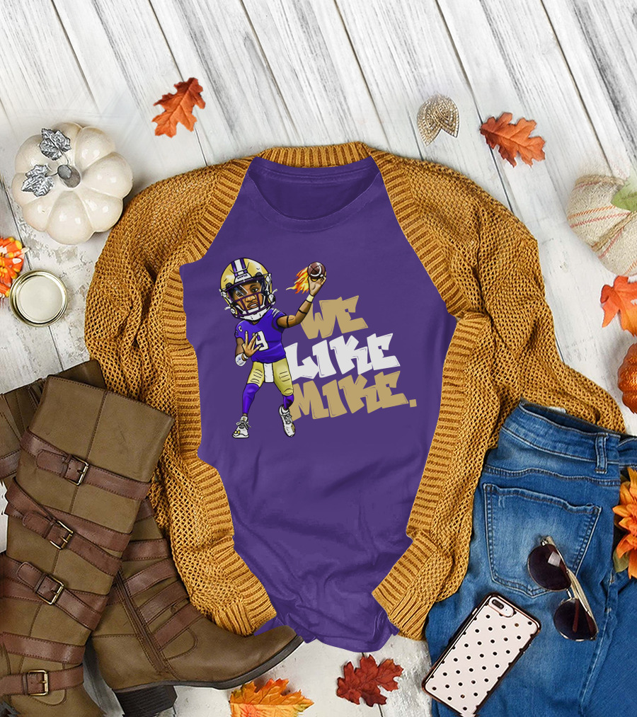 We Like Mike Football Character in Purple and Gold Gear Holding Flaming Ball T-Shirt
