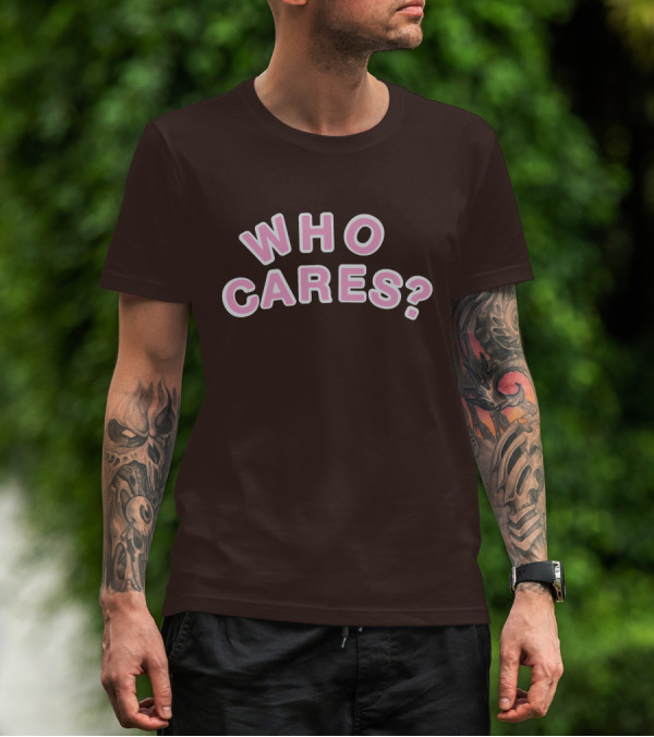 WHO CARES? Pink And White Lettering On Brown Background T-Shirt