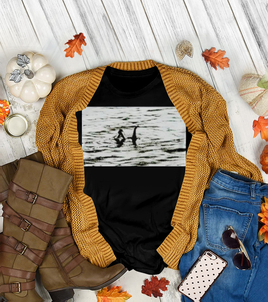 Louis Wearing Palace Nessie Surfers on Loch Ness Monster T-Shirt