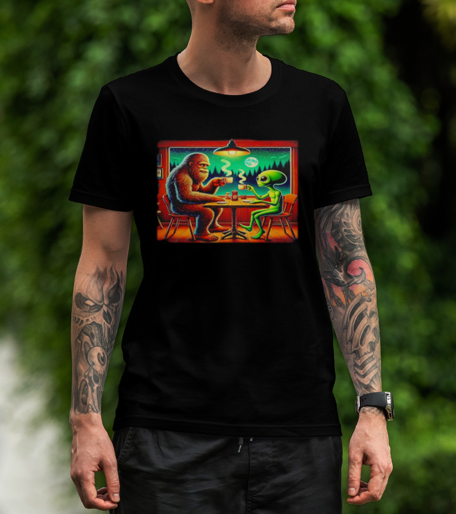 Bigfoot And Alien Coffee Meetup In Cabin At Night With Moonlit Forest T-Shirt