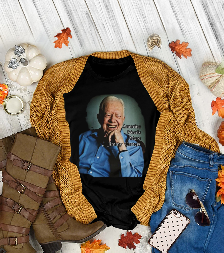 Norbert Leo Butz America Needs More Jimmy Carters Image with Smiling Elderly Man in Blue T-Shirt
