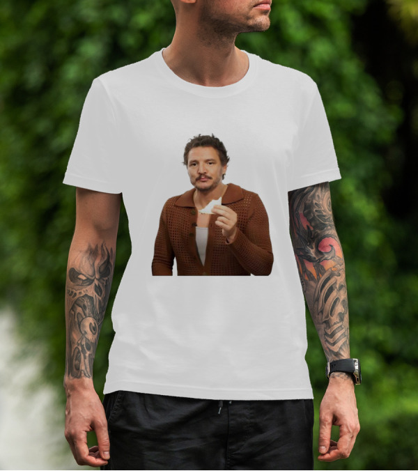 Pedro Pascal Holding Sandwich In Brown T-Shirt