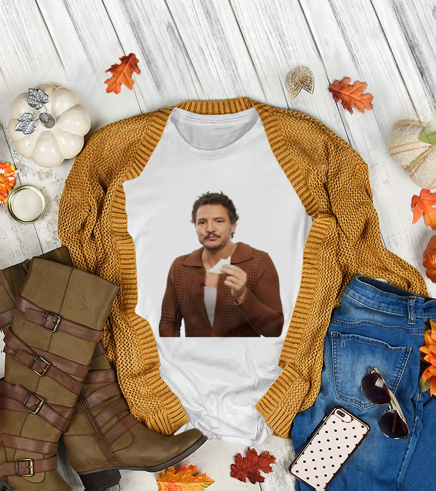 Pedro Pascal Holding Sandwich in Brown T-Shirt