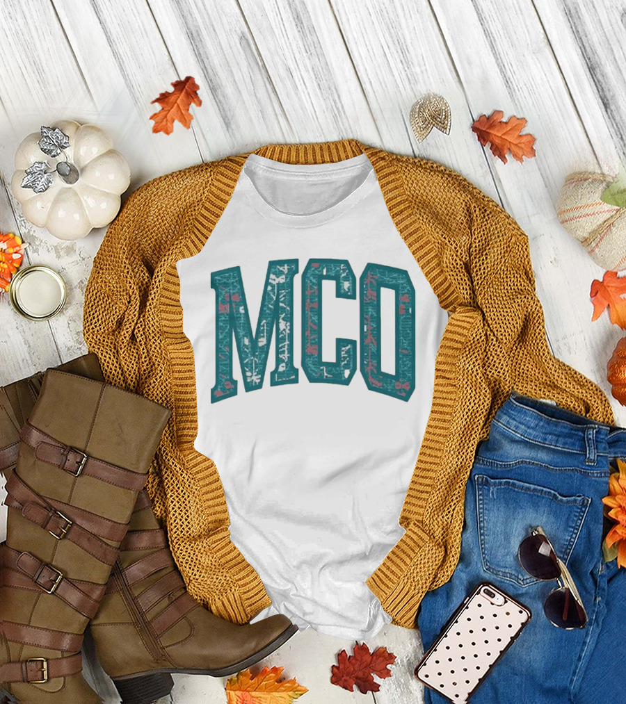MCO Magic Carpet Oasis Vintage Teal Textured Letters T-Shirt