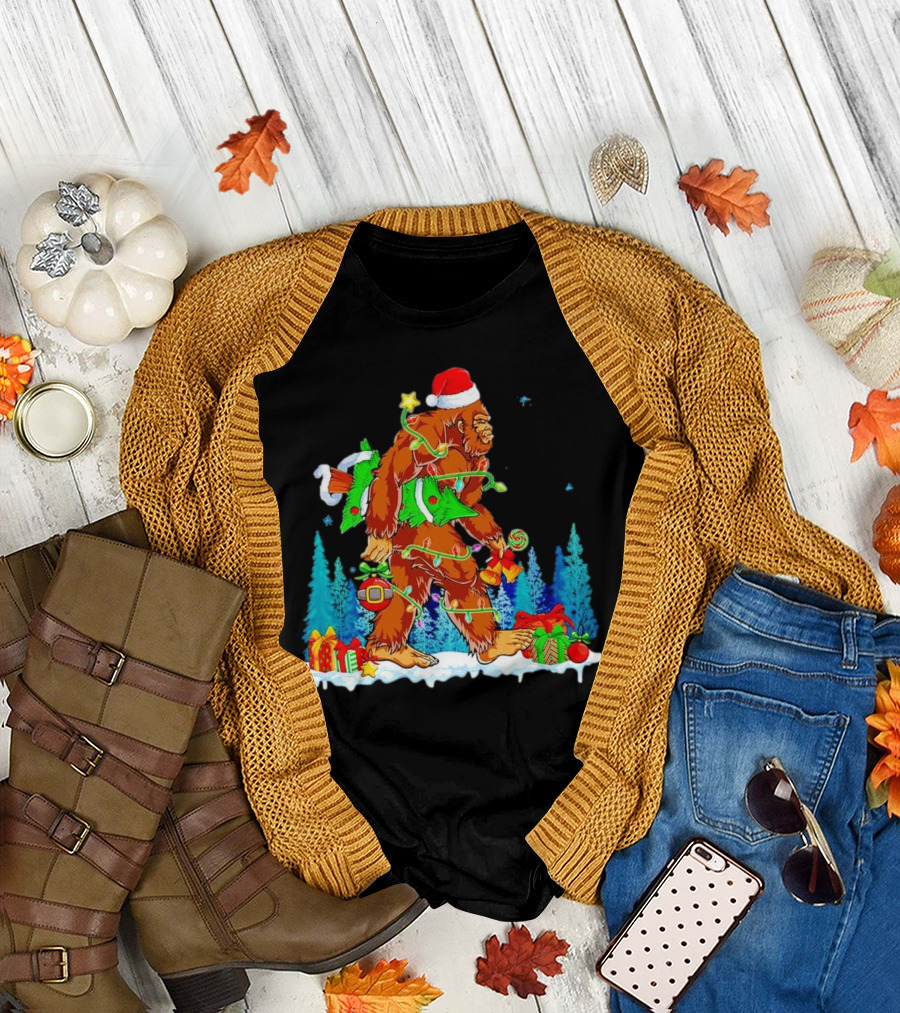 Bigfoot Santa Hugging Christmas Tree with Gifts and Snow Scene T-Shirt