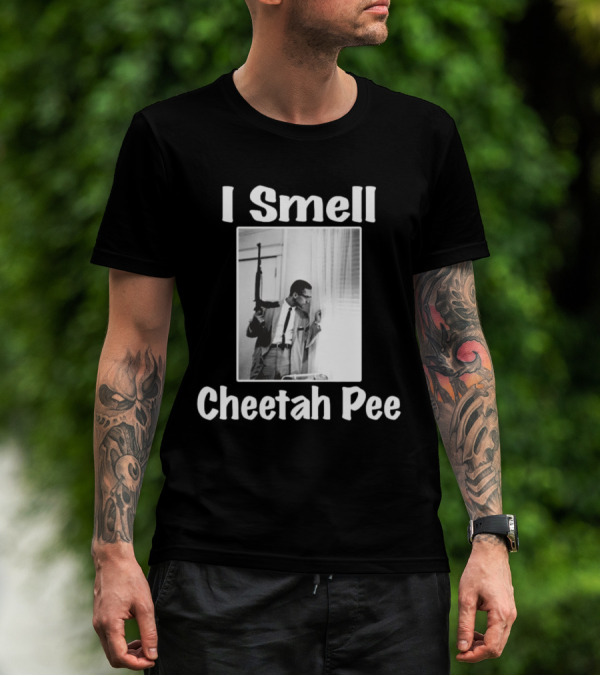 I Smell Cheetah Pee Man Holding Gun By Window T-Shirt