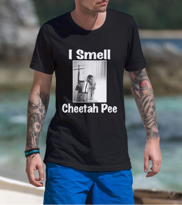 I Smell Cheetah Pee Man Holding Gun By Window T-Shirt