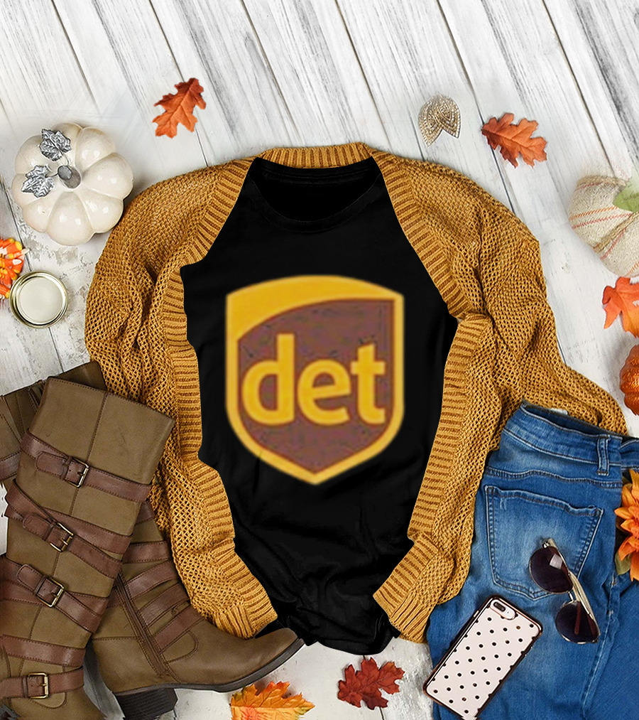 Amon-Ra Wearing Det Saint Brown Football T-Shirt
