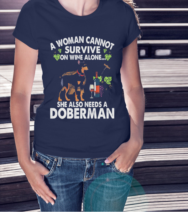 A Woman Cannot Survive On Wine Alone She Also Needs A Doberman T-Shirt
