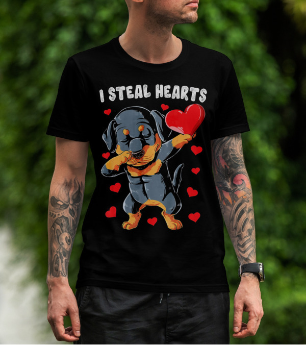 Dabbing Rottweiler Holding Heart Surrounded By I Steal Hearts Text T-Shirt