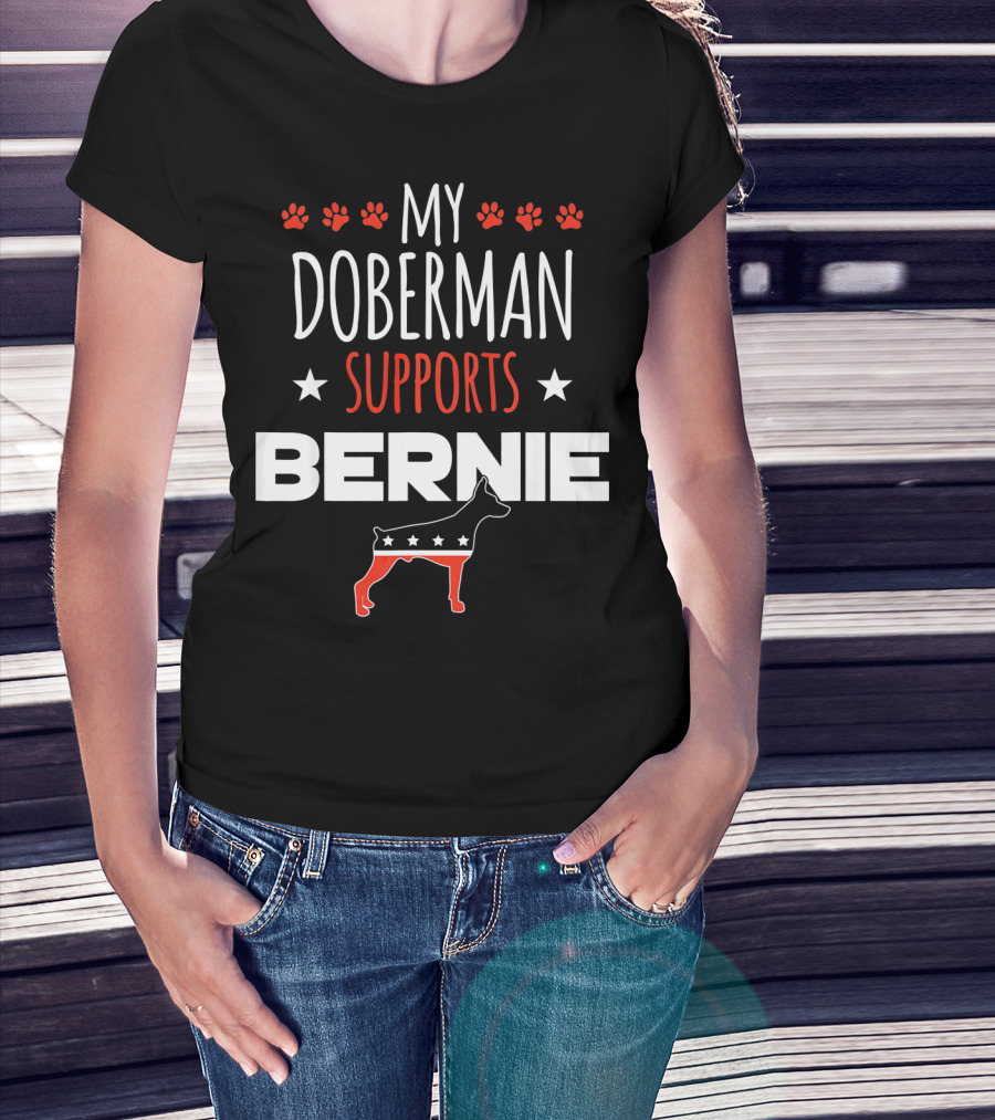 My Doberman Supports Bernie With Red White Blue Stars And Dog Paw Prints T-Shirt