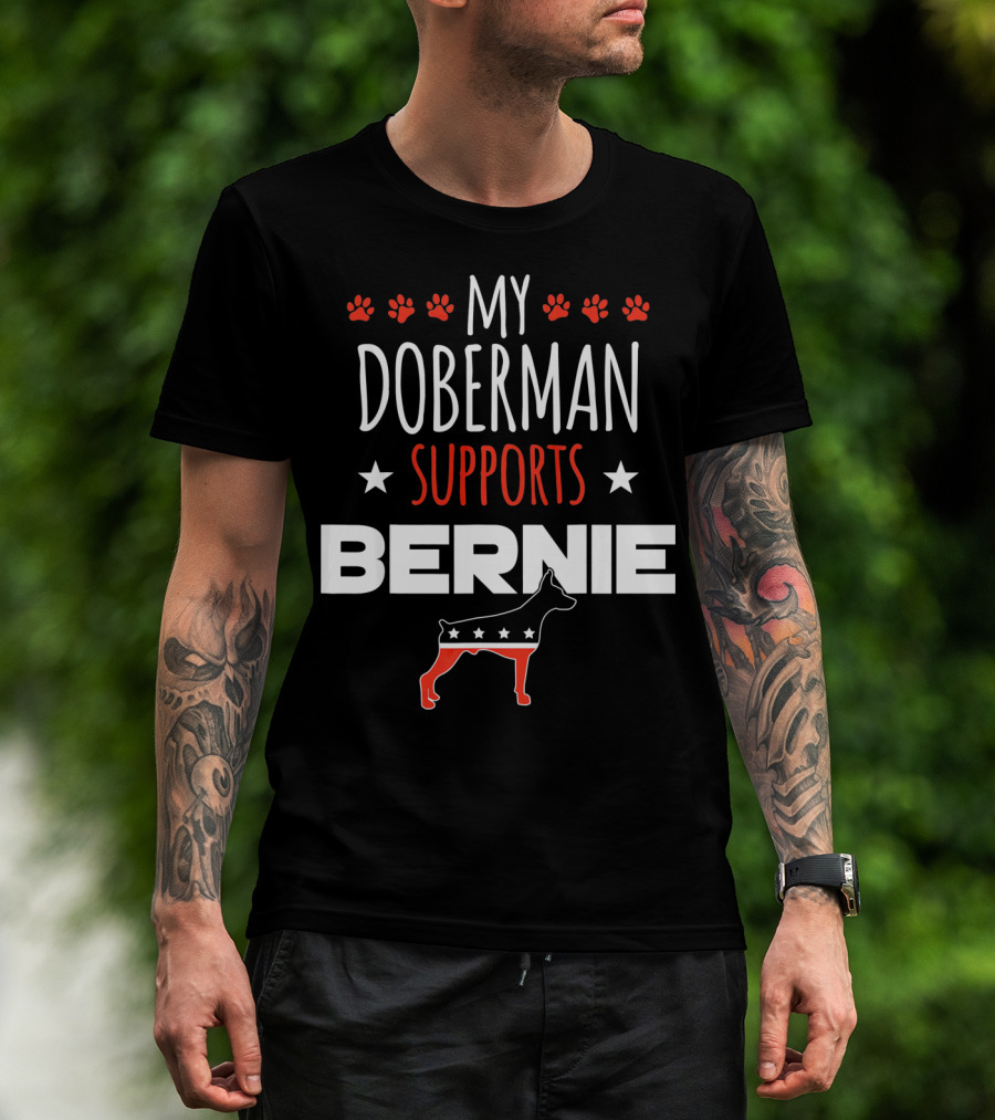 My Doberman Supports Bernie With Red White Blue Stars And Dog Paw Prints T-Shirt