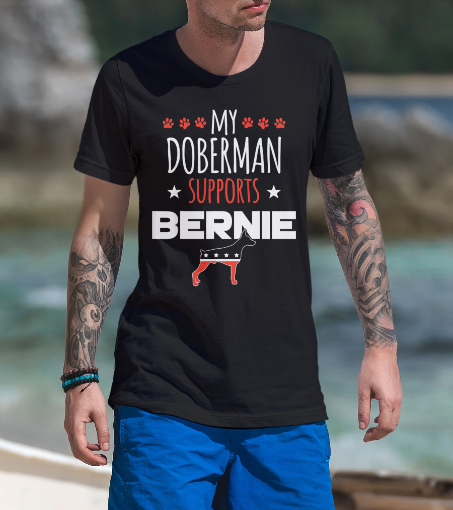 My Doberman Supports Bernie With Red White Blue Stars And Dog Paw Prints T-Shirt