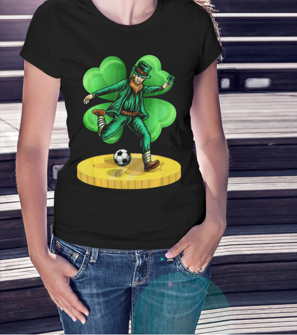 Leprechaun Kicking Soccer Ball On Gold Coin With Shamrock Background T-Shirt