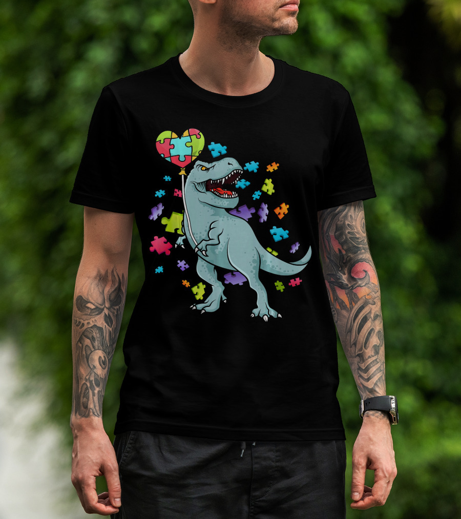 Autism Awareness Dinosaur With Puzzle Heart Balloon And Colorful Puzzle Pieces T-Shirt