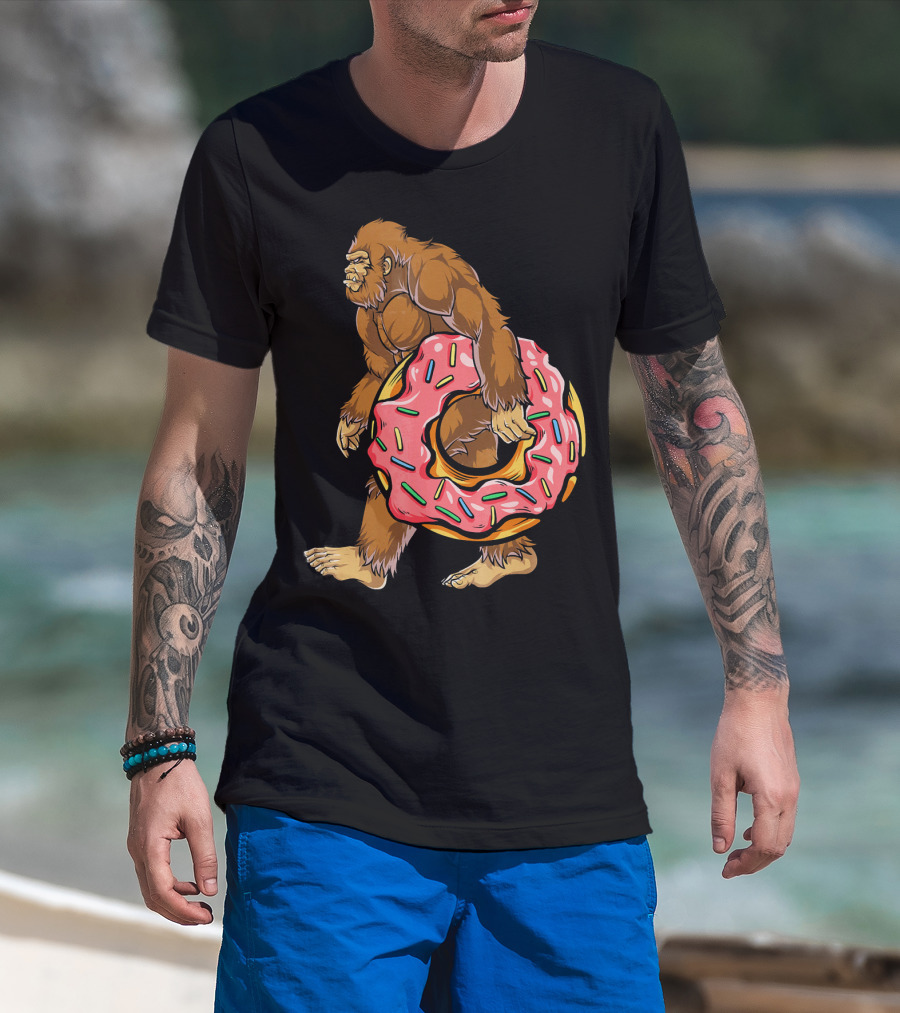 Bigfoot Sasquatch Holding Sprinkled Donut T-Shirt
