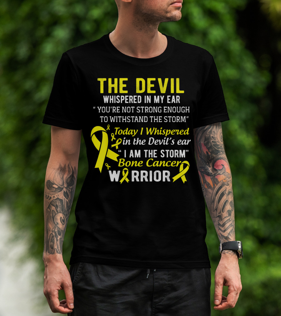 The Devil Whispered You’re Not Strong Enough To Withstand The Storm I Am The Storm Bone Cancer Warrior Yellow T-Shirt