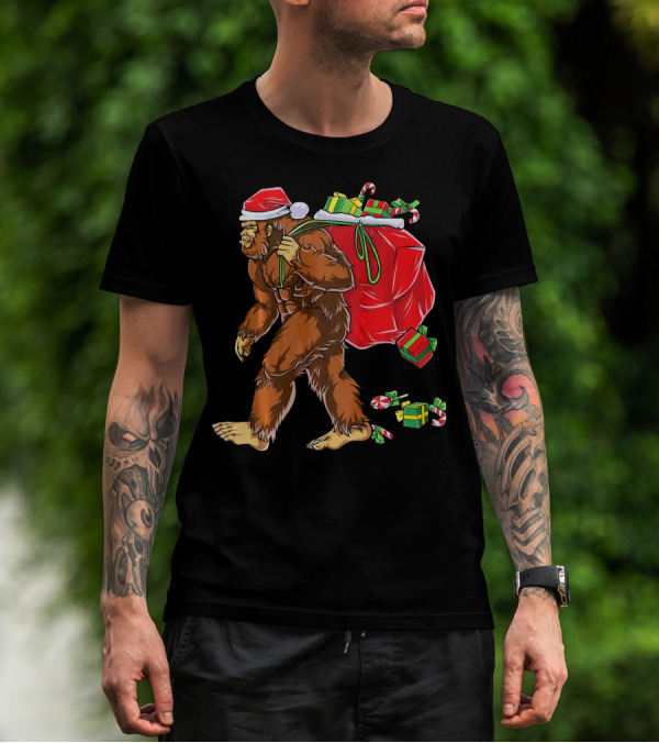 Bigfoot Santa Carrying Gifts With Candy Canes T-Shirt