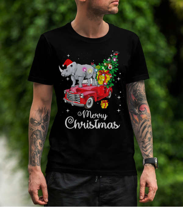 Merry Christmas Rhino Santa Hat On Red Truck With Christmas Tree And Gifts T-Shirt
