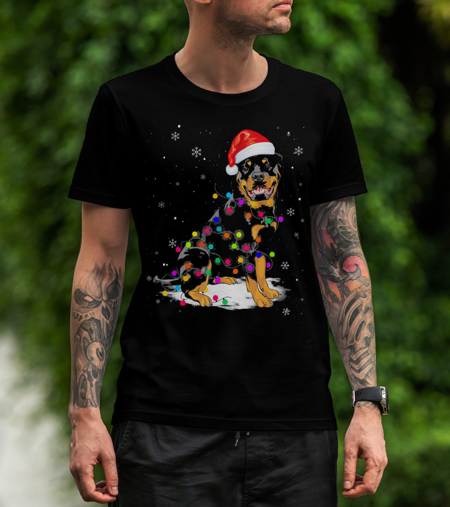 Rottweiler With Santa Hat And Colorful Christmas Lights In Snowy Scene T-Shirt
